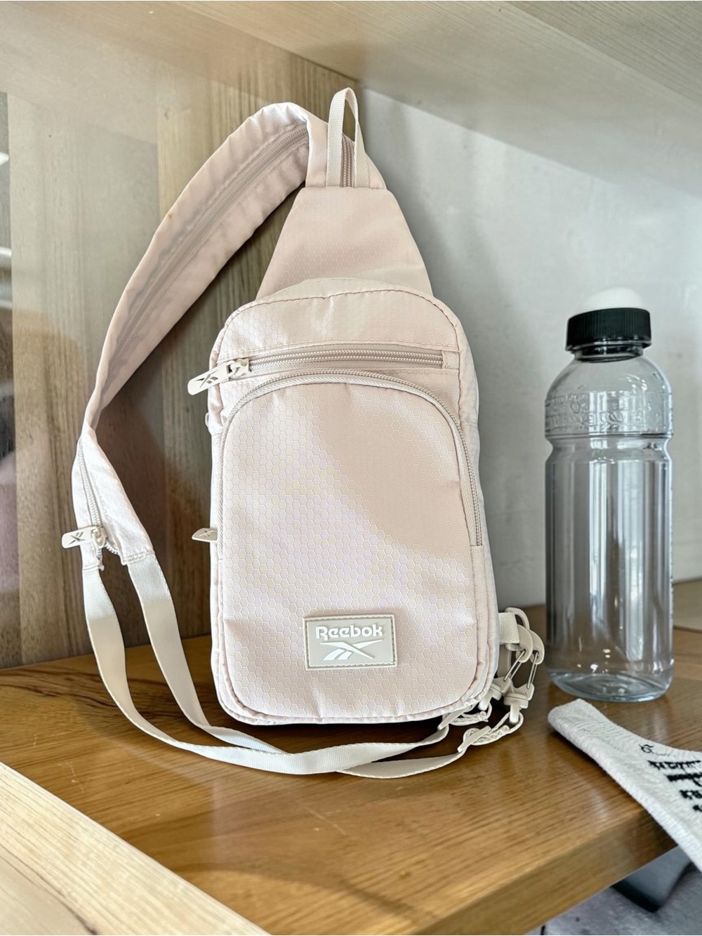 Reebok Small Sling Shoulder Bag in Cream unisex